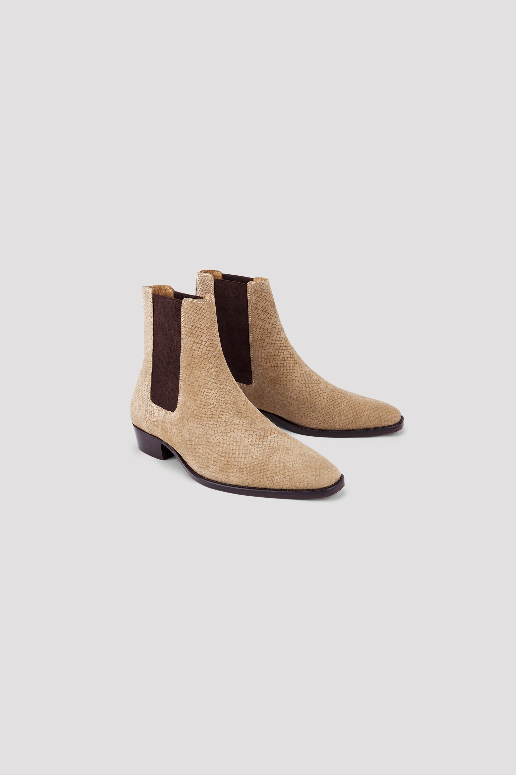 Snake-Effect Chelsea Boots in Sand: Elevate Your Style with Fray's Minimalist Design, Hand-Crafted in Italy. Embossed Snake-Skin, Elasticated Sides, Cuban Heels. Shop Now!